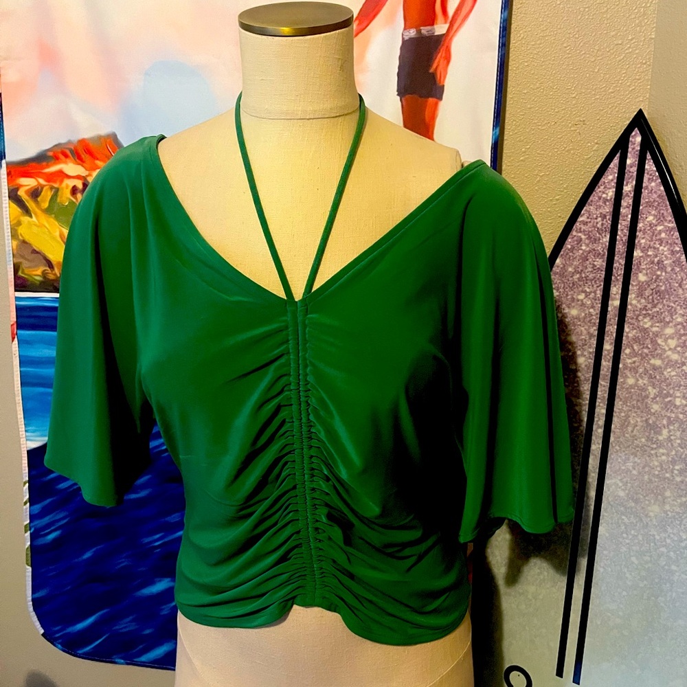 White House black market jewel green top